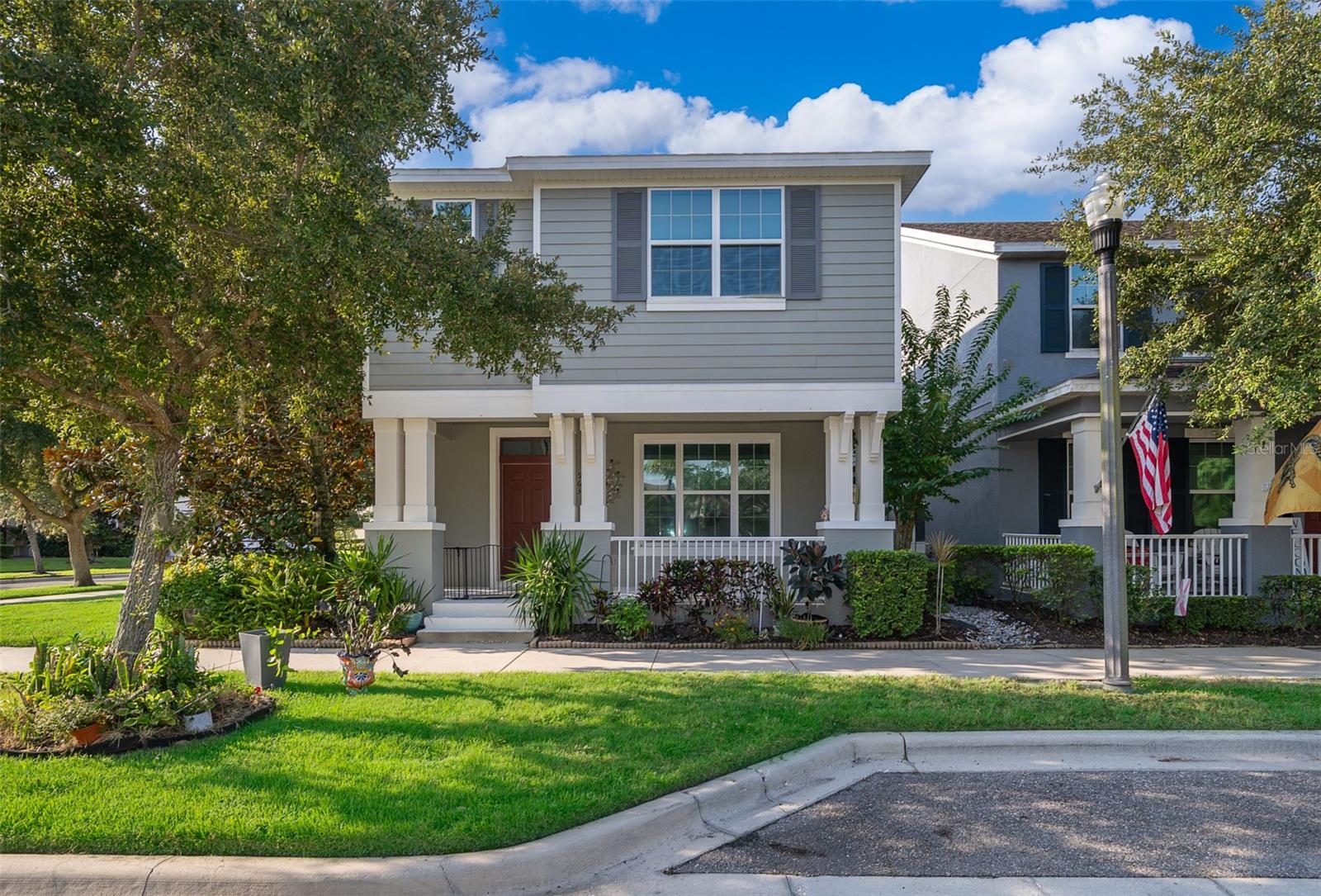 Take a look at this elegant (Meritage Homes) Winter Springs Village Bungalow! Resting on an OVERSIZED, CORNER LOT, this is the largest lot for Bungalows in this community! *FRESH INTERIOR PAINT 2025 *KITCHEN CABINETS PAINTED 2025 *NEW RANGE 2025 *NEW REFRIGERATOR 2024 *EXTERIOR PAINT 2023 *A/C 2023 *WHOLE HOUSE SURGE PROTECTOR 2025*  Two story with a loft, 4 bedrooms, 2.5 bathrooms with attached 2 car garage. Tons of natural light with an open, inviting floorplan. Perfect for relaxing, entertaining & family fun! The beautiful kitchen features gorgeous GRANITE counters & breakfast bar. The upstairs is complete with a loft, ALL BEDROOMS plus convenient laundry room that saves you multiple trips up & down the stairs. Master suite boasts a large walk-in closet and master bath has separate vanities, separate shower and garden tub. There is open guest parking in addition to the rear 2 car Garage. With its highly sought after location, Winter Springs Village amenities include: community pool, playground and recreation clubhouse as well as all lawn care and irrigation. Walk to Winter Springs Town Center, Seminole Cross Trail and Winter Springs High School. Convenient to shopping, dining & more! Schedule a showing today.