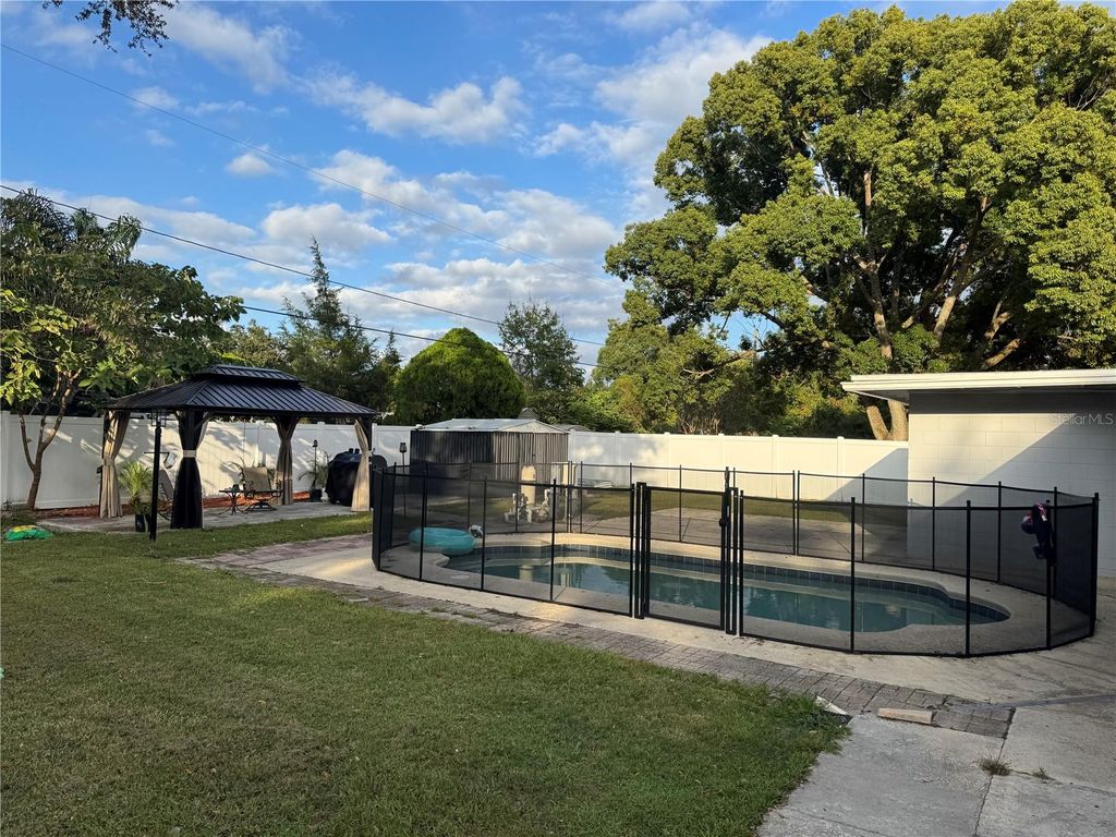 Photo of 1307 Baltimore Drive, Orlando, FL 32810 (MLS # TB8439495)