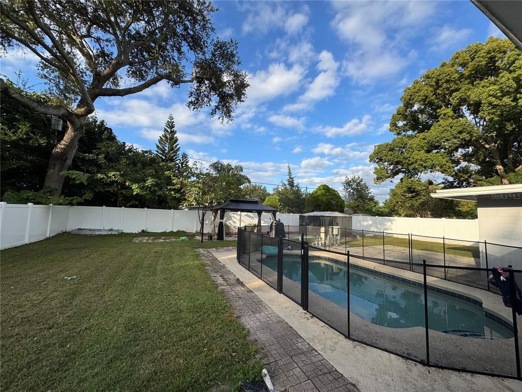 Photo of 1307 Baltimore Drive, Orlando, FL 32810 (MLS # TB8439495)