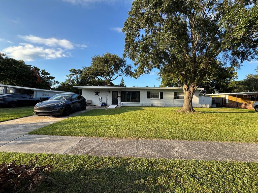 Photo of 1307 Baltimore Drive, Orlando, FL 32810 (MLS # TB8439495)