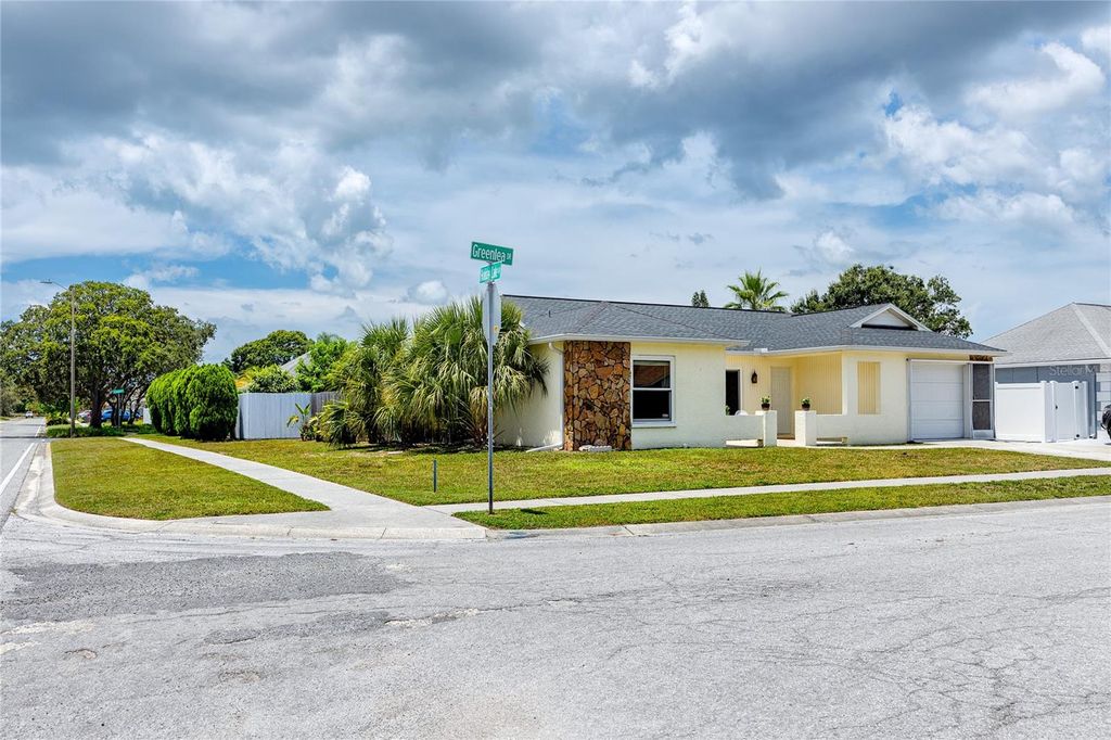 Photo of 1225 Greenlea Drive, Holiday, FL 34691 (MLS # TB8416928)