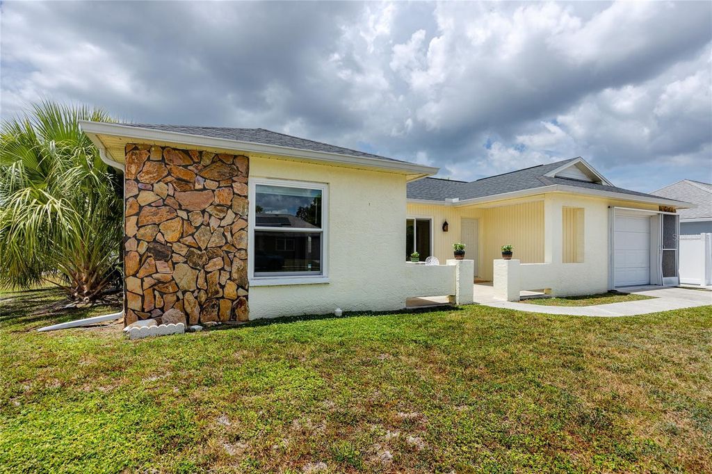 Photo of 1225 Greenlea Drive, Holiday, FL 34691 (MLS # TB8416928)