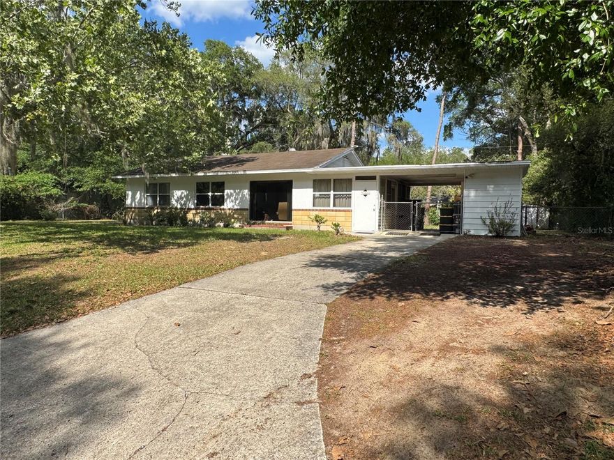 Location, location, location!
 This solid block home is perfectly positioned near the University of Florida, UF Health, the VA Hospital, shopping, dining, and more, making it an excellent opportunity for investors or buyers with vision.
Offering 1,152 SF of living area (1,445 SF total), this 2-bedroom, 1-bath home features a Florida room and a small office, providing flexible living space with plenty of potential. The property sits on a .24-acre fully fenced lot, offering room to expand, reconfigure, or create an outdoor oasis.
The home does need some renovation and is priced accordingly; however, it is livable in its current condition. The current owners have lived in the home since 1986, reflecting long-term ownership and solid construction.
Buyer to note: the seller has installed a new water heater and water lines, the seller replaced old windows throghout the home with new double pane windows, as well as completed some electrical work, all of which were done without permits. The exterior was painted in 2025.  Buyer to verify and accept property condition.  
With the right updates and imagination, this property presents a rare opportunity to create a standout residence or income-producing investment in one of Gainesville’s most desirable and convenient locations. Bring your contractor and your vision!