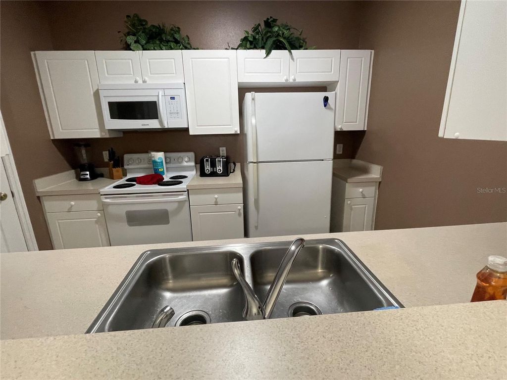 Photo of 2307 Silver Palm Drive #102, Kissimmee, FL 34747 (MLS # O6392836)