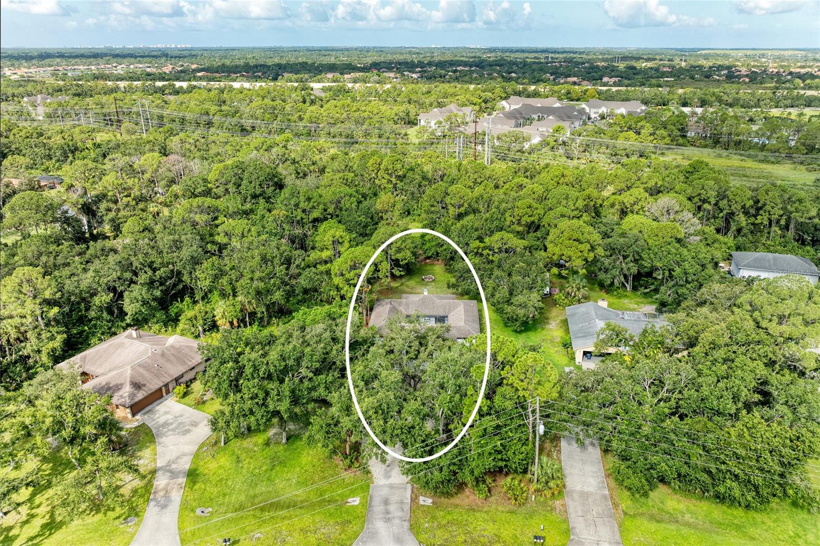 One or more photo(s) has been virtually staged. Welcome 6423 95th St E, Bradenton located in desirable community of Braden Woods. A low HOA, No CDD community. Enjoy the convenience of being just minutes from UTC Shopping Center, vibrant downtown Lakewood Ranch, charming downtown Sarasota, and our world-famous beaches.
The property displays beautifully (New exterior paint 2025) as you walk up the driveway and through the front door to a central atrium with newly installed deck (07/2025) space where you can install a hot tub or a green house and enjoy evenings in this private retreat. The home's open-concept layout creates a seamless flow between rooms, enhanced by modern finishes and an abundance of natural light. The living area boasts wood-look flooring, a ceiling fan, and large sliding glass doors that provide views of the lush exterior landscape. A fireplace with built-in shelving adds a cozy touch to the space. The kitchen boasts a newer cabinetry, granite countertops and stainless-steel appliances (2022). All bedrooms and bathrooms have been recently updated.
Throughout the home, neutral tones dominate the walls and flooring, creating a bright and airy atmosphere. The property's design emphasizes indoor-outdoor living, with multiple windows and sliding glass doors connecting interior spaces to the surrounding greenery. This single-story layout offers convenience and accessibility, making it an ideal choice for various lifestyle needs.
This 4-bedroom, 3-bathroom home is situated on over an acre lot with unlimited possibilities for a pool or outdoor space overlooking mature trees in the backyard.
One or more photo(s) has been virtually staged.