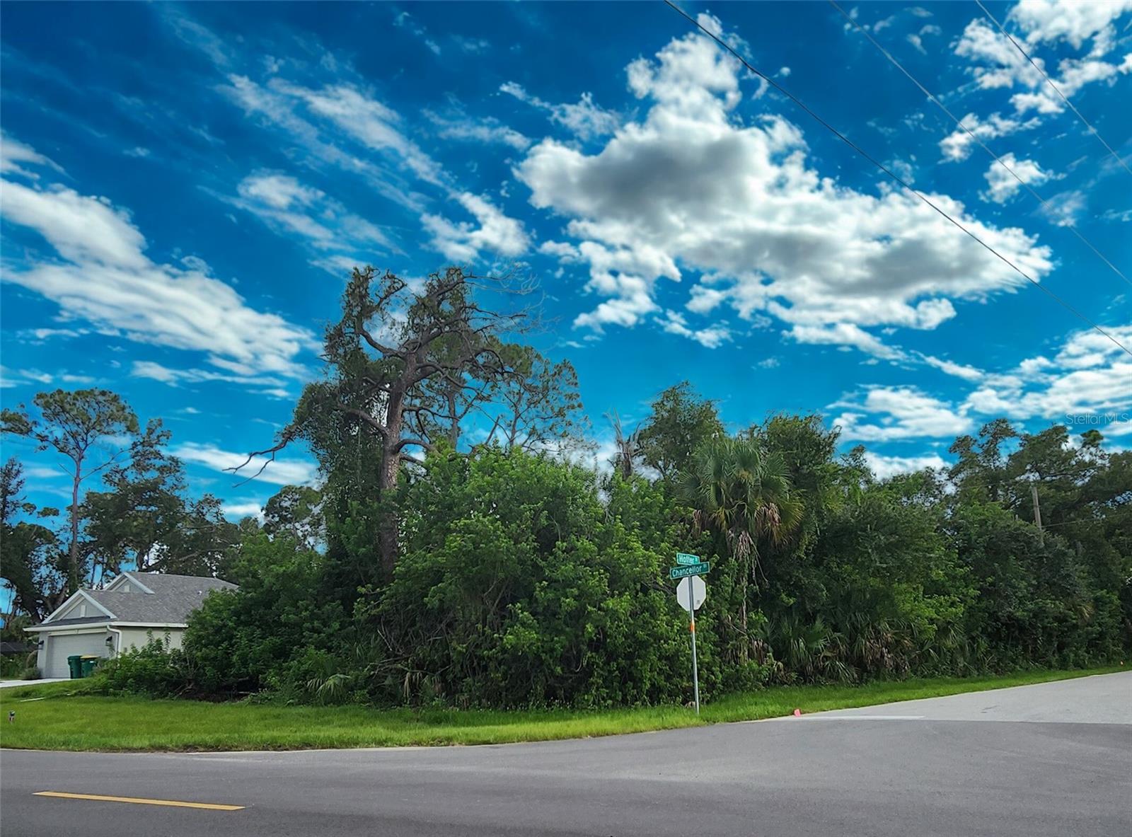 Come build your dream home on this generous oversize lot in Port Charlotte, zoned for single-family. Located in Port Charlotte, this lot offers paved road frontage, access to utilities. The site is ideal for a custom build with plenty of space for outdoor living. Enjoy proximity to beaches, shopping, parks, and Florida sunshine. No known CDD fees.