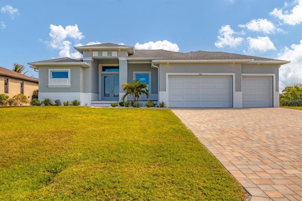 Photo of 216 W Pine Valley Lane, Rotonda West, FL 33947 (MLS # D6145212)