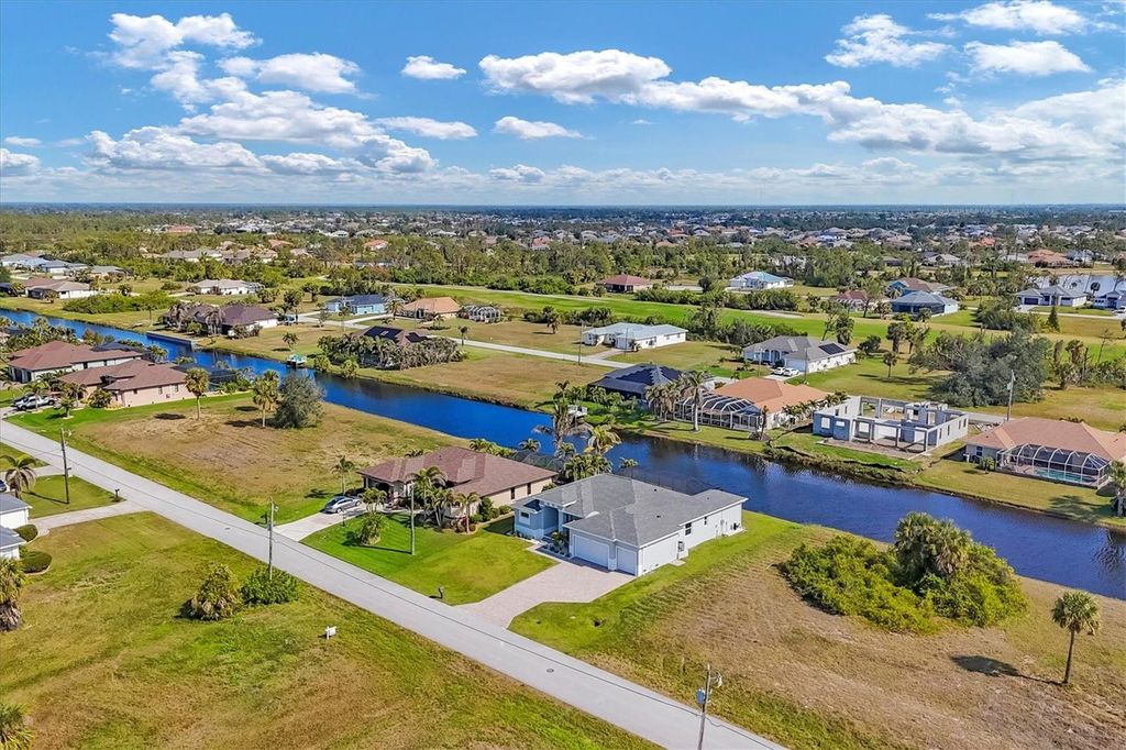 Photo of 216 W Pine Valley Lane, Rotonda West, FL 33947 (MLS # D6145212)