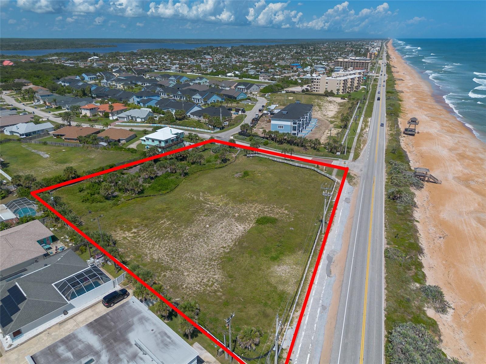 Ready to build 18 unit oceanfront townhome condominium project. 331' of beautiful littoral ocean frontage in Ormond Beach and 2.89 acres overall. Development order has been received and the current owners approved development is an 18 unit modern urbanist community featuring 3 story units with elevators and rooftop terraces. Plans are complete for the 4 proposed unit floor plans. Extensive marketing and operational materials are available for the current proposed development including community virtual tour, website, along with all required condominium documents which have been submitted and approved by the Florida Division of Condominiums. Water and sewer are onsite. Flood Zone X !! Once in a lifetime development opportunity in Paradise.