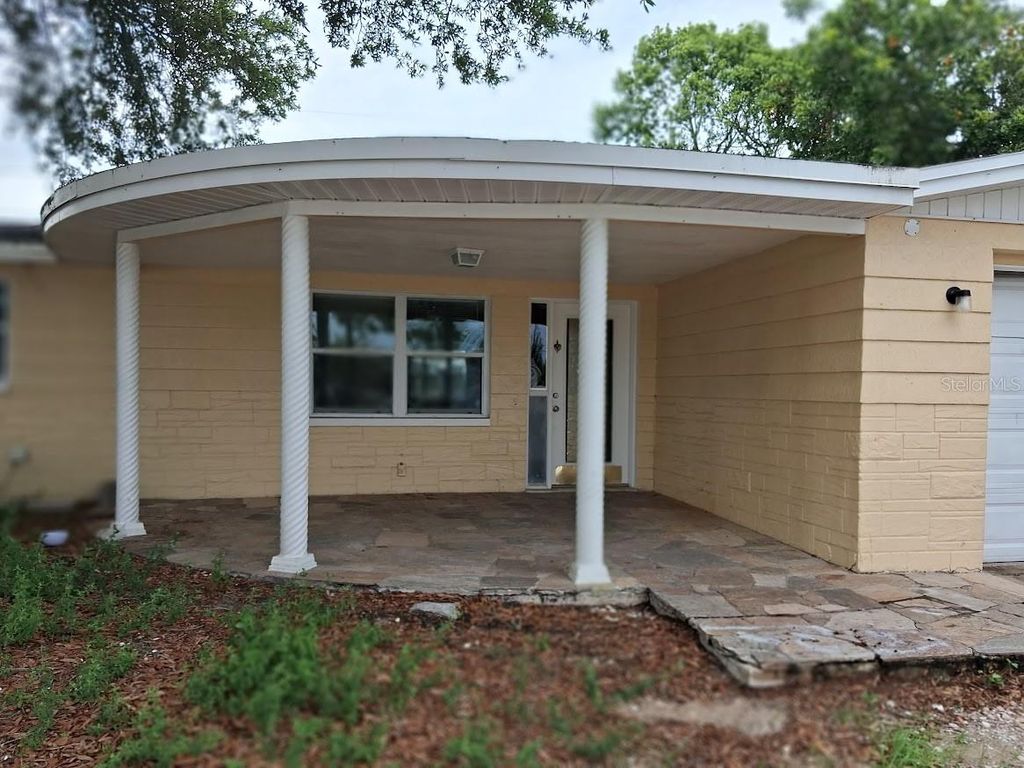 Photo of 4926 Colonnade Avenue, Holiday, FL 34690 (MLS # TB8521091)