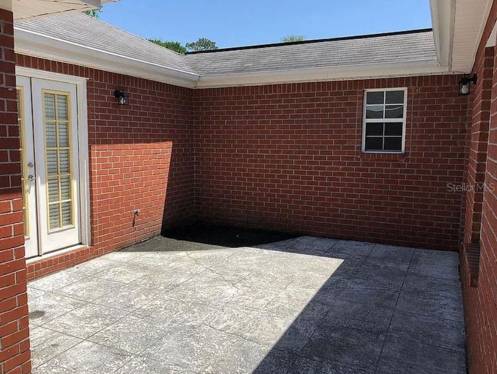 Photo of 1548 Pelican Point Drive, Cantonment, FL 32533 (MLS # TB8453017)