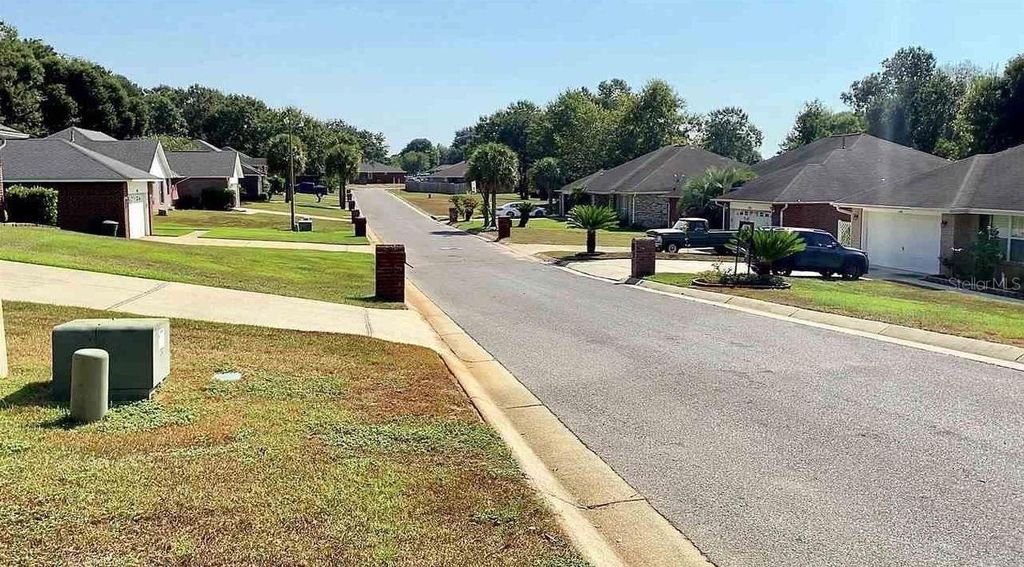 Photo of 1548 Pelican Point Drive, Cantonment, FL 32533 (MLS # TB8453017)