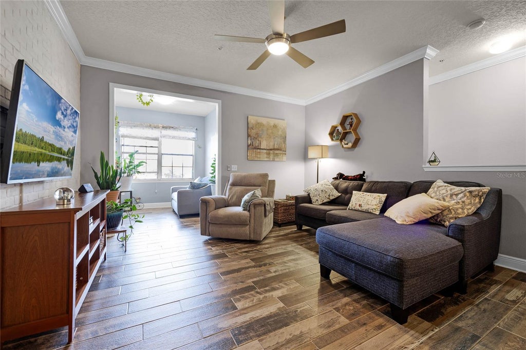 Photo of 430 Southern Pecan Circle #207, Winter Garden, FL 34787 (MLS # O6425239)