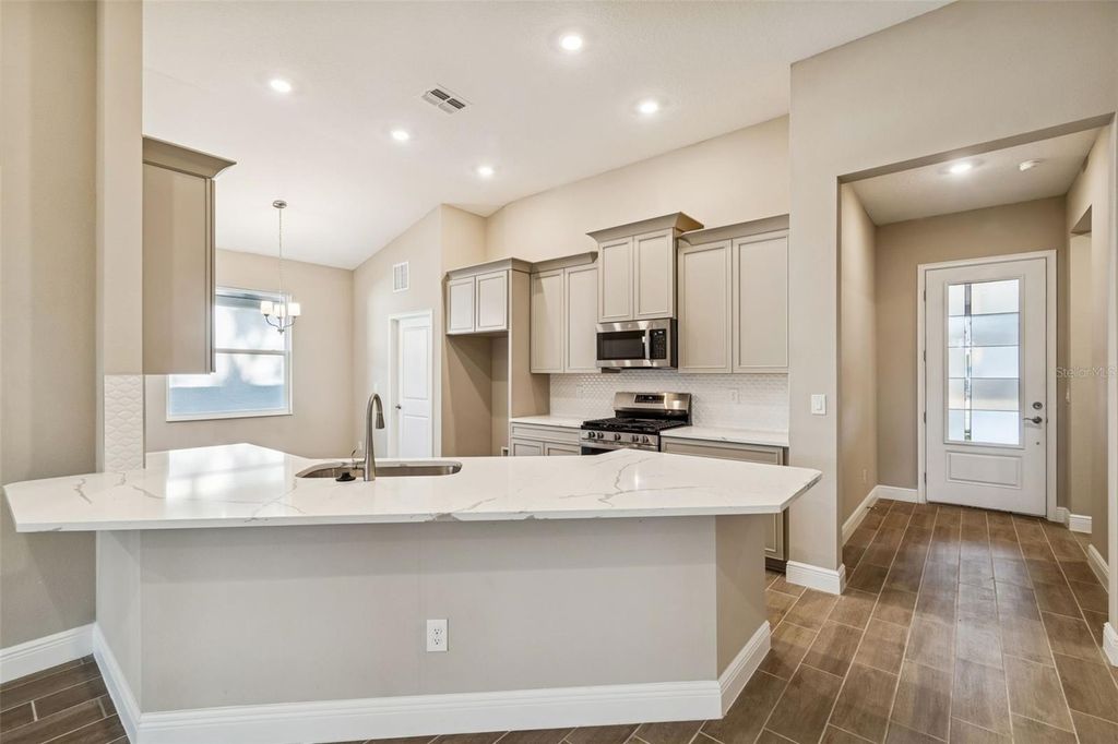 Photo of 19431 Forest Garden Court, Brooksville, FL 34601 (MLS # TB8462211)