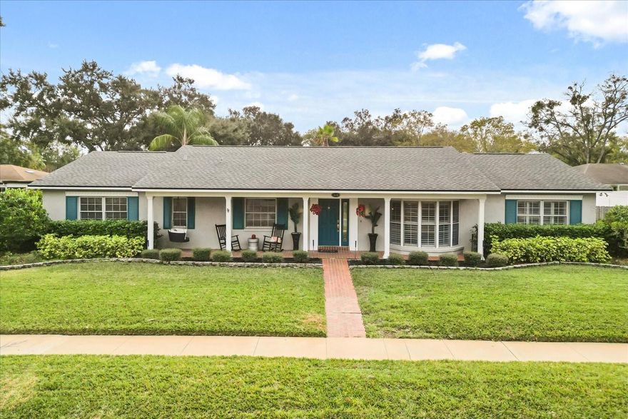 Welcome home to one of the most established Maitland neighborhoods in a pristine location close to everything, Maitland Groves. A lovely brick walkway invites you up to a charming entrance with a bricked front porch. A 4-or-5-bedroom, 4-bath home features nearly 3,000 SF with a generous flex space, checks all the boxes. The spaces have been opened with living spilling into dining and a bay window adding charm to a perfect gathering room to entertain in. Custom tile throughout for seamless design with an abundance of light making the spaces inviting and easy to relax in.  Kitchen is updated with custom 42” wood cabinets, custom moldings, stainless appliances with new dishwasher, gas range and oven, granite counters with counter seating and unbelievable storage and cabinet space. Florida room spans the back of the house with a bricked floor, a wet bar and a dedicated office/bedroom. Updated master bedroom with a large walk-in closet. Master bath with dual sinks and new rainfall shower heads, tower storage cabinets, seamless glass with walk-in shower, stone floor and custom tile. Outside patio enjoys a pavered deck with large Florida Pool and plenty of green space with room to grow. Other updates include roof (2021), Solar energy system so energy bills are LOW, recently painted in select areas, wood laminate floors in all bedrooms, renovated 2nd and 3rd baths, spacious indoor laundry and mudroom for organization, fenced yard, recessed lighting in living spaces, re-plumbed, plantation shutters, 2021 pool pump, pool converted to saltwater system, new garage door . If you need space, this has it. Terrific schools, close to I-4, downtown Maitland which is home to Lake Lily with a weekly farmers market, independently owned Enzian Theatre, world-class restaurants and fantastic community parks which are home to many community events.