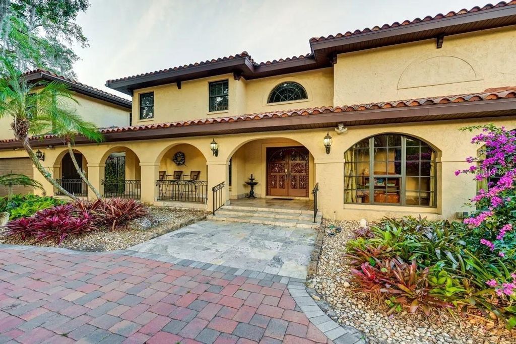 Photo of 12103 Brightwater Boulevard, Temple Terrace, FL 33617 (MLS # TB8504181)