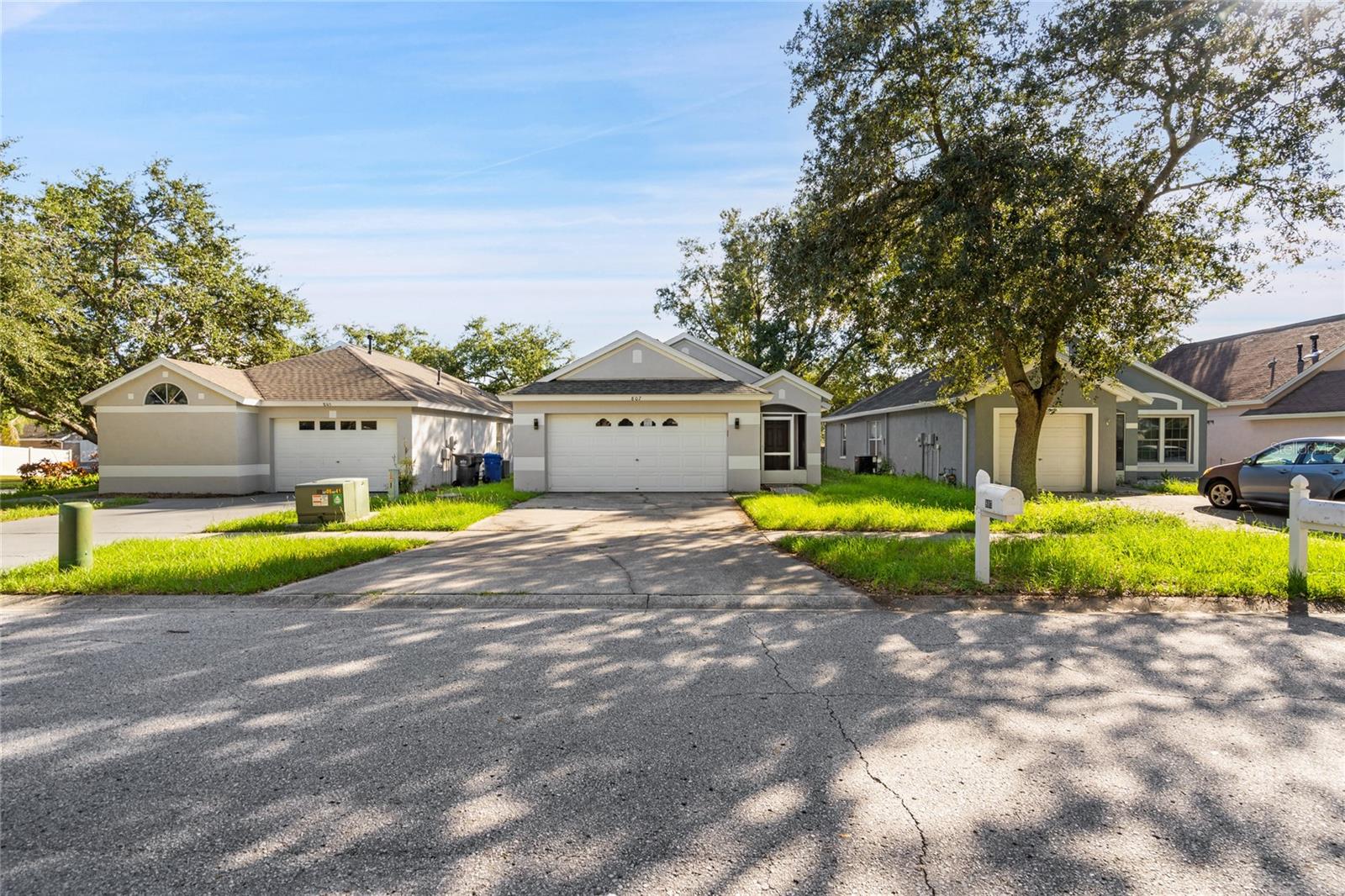 Move-In Ready & Immaculate!
This beautifully maintained 3-bedroom, 2-bath home features a spacious 2-car garage, screened lanai, and the bonus of no CDD fees and very low HOA dues. Recent updates include a new roof (2022) and new water heater (2023), offering peace of mind for years to come.
Step inside to an inviting open floor plan with fresh interior paint, luxury vinyl wood flooring, and tile throughout—no carpet! The kitchen boasts stainless steel appliances, a gas range with microwave, deep sink, and breakfast bar seating for 2–4. Washer and dryer in the garage are also included. The primary suite offers his-and-hers closets and a spa-like bath with a walk-in shower, custom tile work, and a rain head. Outdoor living shines with a fenced backyard, screened front porch, and screened lanai—perfect for relaxing or entertaining. Seller never lived in Property, so Buyer is to confirm all HOA and MLS Information. Please have your Realtor® review all Private Remarks for important details.