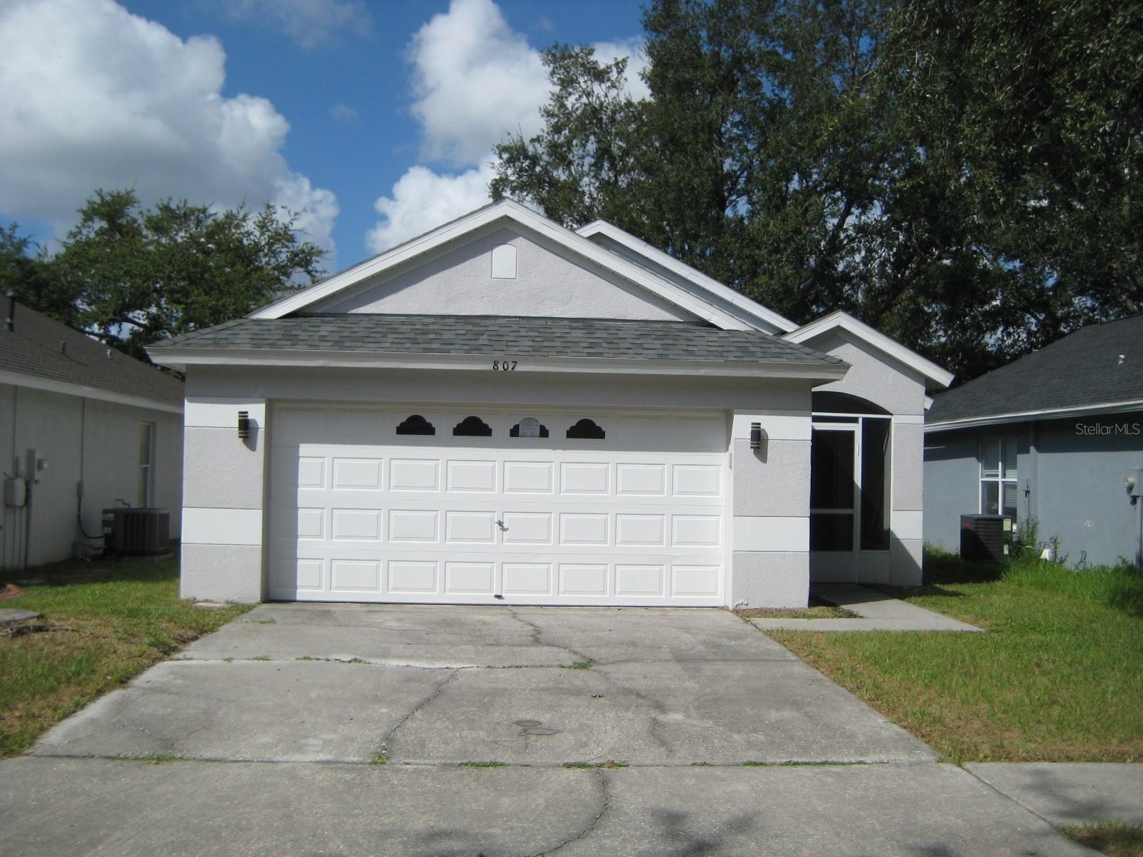 Move-In Ready & Immaculate!
This beautifully maintained 3-bedroom, 2-bath home features a spacious 2-car garage, screened lanai, and the bonus of no CDD fees and very low HOA dues. Recent updates include a new roof (2022) and new water heater (2023), offering peace of mind for years to come.
Step inside to an inviting open floor plan with fresh interior paint, luxury vinyl wood flooring, and tile throughout—no carpet! The kitchen boasts stainless steel appliances, a gas range with microwave, deep sink, and breakfast bar seating for 2–4. Washer and dryer in the garage are also included. The primary suite offers his-and-hers closets and a spa-like bath with a walk-in shower, custom tile work, and a rain head. Outdoor living shines with a fenced backyard, screened front porch, and screened lanai—perfect for relaxing or entertaining. Seller never lived in Property, so Buyer is to confirm all HOA and MLS Information. Please have your Realtor® review all Private Remarks for important details.