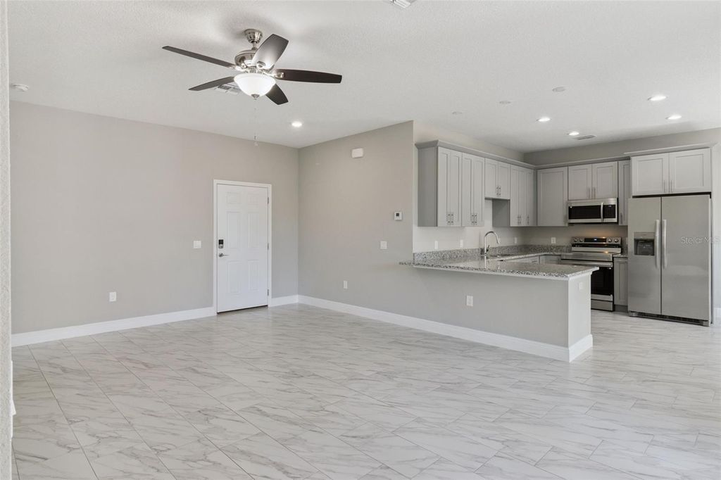 Photo of 1209 Atlantic Way, Kissimmee, FL 34759 (MLS # O6378573)