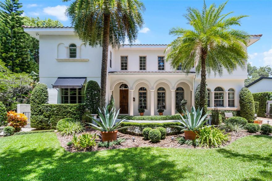 Exquisite Mediterranean Masterpiece in the Heart of Orlando!
Welcome to 419 Raehn St—a custom-built luxury estate where timeless Mediterranean elegance meets modern sophistication. This 4-bedroom, 3.5-bathroom residence offers an expansive layout, impeccable craftsmanship, and high-end finishes throughout.
Step inside to be greeted by soaring 20-foot ceilings, a dramatic curved staircase, and a stunning wood-burning fireplace in the grand formal living room. A retractable chandelier adds convenience and charm, while the seamless flow into the informal living area, complete with a custom entertainment center, a wet bar, and a temperature-controlled 600-bottle wine cellar, creates the perfect ambiance for both intimate and grand gatherings. French doors lead out to the backyard oasis.  
The recently remodeled chef’s kitchen is a true showstopper, featuring professional-grade stainless steel appliances, a gas cooktop with pot filler, double convection ovens, an apron-front farmhouse sink, custom vented hood, and soft-close cabinetry. A butler’s pantry with a wine refrigerator connects to the elegant formal dining room, which boasts a built-in china closet, designer lighting, and rich wood floors.
Designed for versatility, this home offers a private office with exquisite wood coffered ceilings, built-ins, a walk-in closet, and its own entrance—perfect for working from home. Upstairs, a sprawling 20’ x 18’ loft opens to a 38’ x 10’ balcony with breathtaking downtown Orlando skyline views. The primary suite is a private retreat, showcasing wood floors, a dressing room, dual custom walk-in closets, a spa-like bath with a soaking tub, oversized walk-in shower, and dual vanities. Two additional bedrooms, a second loft, and a spacious laundry room with built-in cabinetry complete the second level.
Step outside to your private backyard paradise, enclosed by a stucco wall and custom iron gate. A covered 38-ft travertine patio extends around the heated saltwater pool and spa, creating a resort-style feel. Entertain effortlessly with the built-in grill and outdoor refrigerator, while the detached two-car garage and brick-paver driveway add both convenience and curb appeal.
With impeccable landscaping, designer finishes, and an unbeatable location, this home offers an unparalleled blend of luxury, comfort, and timeless beauty. Schedule your private tour today and experience the finest in Orlando living!
