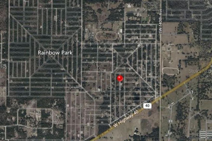 Build your future in the growing community of Rainbow Park in Ocala. This vacant lot presents an excellent opportunity for builders, investors, or buyers ready to design a custom home in one of the area’s expanding locations. Conveniently situated near shopping, dining, parks, and the World Equestrian Center, this property offers both flexibility and potential with no HOA restrictions.