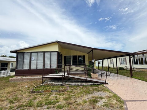 Photo of 35044 Mcculloughs Leap, Zephyrhills, FL 33541 (MLS # W7887050)