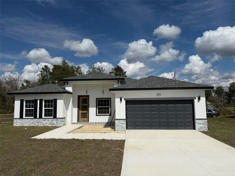 Photo of 171 Marion Oaks Trail, Ocala, FL 34473 (MLS # O6284340)