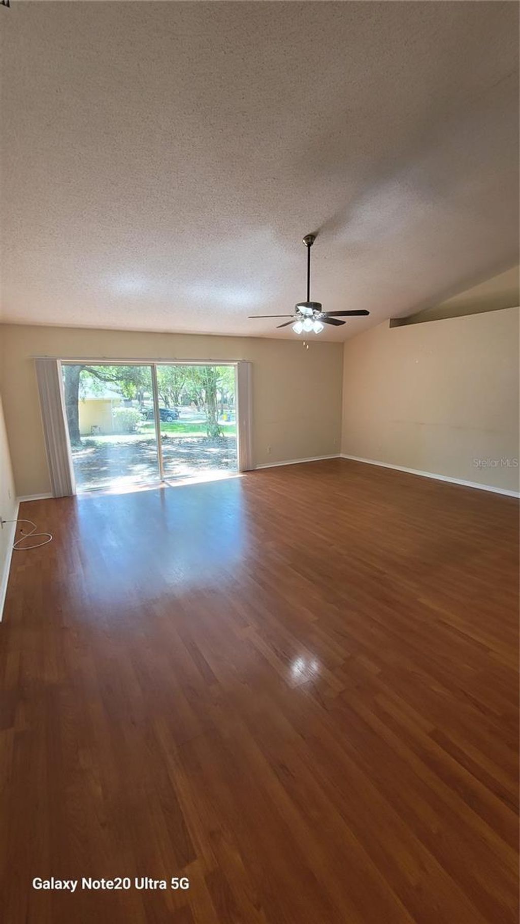 Photo of 1346 Rain Forest Lane, Minneola, FL 34715 (MLS # TB8493906)