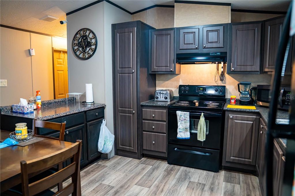 Photo of 132 Nutmeg Trail, Interlachen, FL 32148 (MLS # TB8458684)