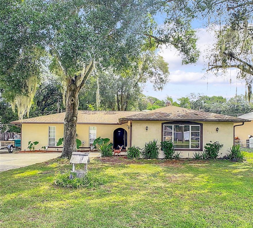 OWNER MOTIVATED! NEW PRICE IMPROVEMENT! This spacious 3-bedroom, 2-bathroom home hosts generous living spaces that are perfect for your family and entertaining needs. Utilize the large bonus room as your home office, family room, playroom, or workout room. A separate dining room provides an ideal setting for memorable gatherings and special meals. Large fenced-in backyard with an open patio also includes a 20 x 10 workshop equipped with electricity giving you ample space for pursuing your hobbies or for storage. Roof 2017, Drain field 2017, AC blower motor and boost kit 2017. Have peace of mind knowing the seller is also offering a 1-year Home Warranty through American Home Shield. No HOA and plenty of parking for your trailer, boat or RV. Convenient access to the Florida Turnpike, Hwy 441, and Hwy 27 and just minutes away from shopping and beautiful Lake Griffin State Park. Fruitland Park is a great place to call home!