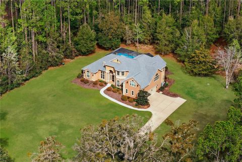Photo of 19056 NW 72nd Avenue, Alachua, FL 32615 (MLS # OM719647)
