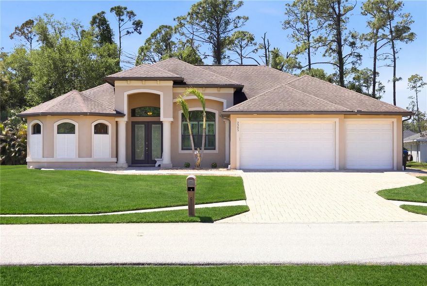 Welcome to your North Port oasis, an extraordinary 3-bedroom, 2-bath residence with a dedicated office, perfectly positioned on a sprawling half-acre lot, meticulously designed for the ultimate Florida lifestyle. Step inside to admire the seamless tile flooring extending throughout, complemented by trey ceilings in the living room and primary suite, along with stylish plantation shutters and ceiling fans in every room. The vanished corner sliders effortlessly merge indoor and outdoor living, opening to a breathtaking outdoor paradise featuring a large heated pool, perfectly framed by beautiful pavers, an outdoor kitchen, and an outdoor shower – ideal for year-round enjoyment and entertaining. The expansive primary ensuite is a true sanctuary, boasting two spacious walk-in closets, a luxurious walk-around shower, and separate his-and-her vanities, with direct access to your stunning outdoor retreat, a convenience also shared by a versatile spare room. With a generous three-car garage, a tall built-in kitchen pantry, double entry doors, and hurricane windows and doors, there’s ample space for vehicles, storage, and peace of mind, while the thoughtful split design with a pocket door for bedrooms two and three ensures privacy and comfort for both residents and guests. This meticulously crafted home offers an unparalleled blend of luxury, comfort, and functionality, truly making it the perfect setting for your dream Florida lifestyle.