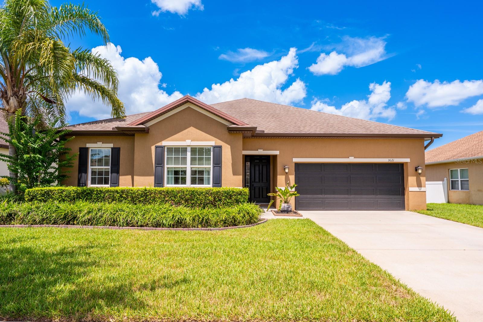 This property QUALIFIES FOR A CREDIT UP TO $7275 through the seller's preferred lender & seller may consider buyer concessions if made in an offer ***Step into style, comfort and thoughtful updates in this meticulously maintained single story home in the desirable Brynmar community of Ocoee! With major improvements already done - like a NEW A/C (2024) and FRESH PAINT INSIDE & OUT, this home is move-in ready and designed for everyday living. Boasting 3 spacious bedrooms plus a VERSATILE FLEX ROOM that serves as your fourth bedroom or home office, this 3-WAY SPLIT LAYOUT offers an ideal balance of privacy and functionality. High end LUXURY VINYL PLANK FLOORING flows through the main living areas, complementing the OPEN CONCEPT and high ceilings that create a light and bright atmosphere. The heart of the home is the beautifully UPGRADED KITCHEN, where form meets function! A gorgeous WOOD SLAT FEATURE WALL adds a modern, custom touch to both the dining space and the oversized island. Sleek QUARTZ COUNTERTOPS, a DOUBLE WALL OVEN, cooktop, stylish backsplash, and ample storage make this kitchen as practical as it is eye-catching. Recessed and pendant lighting complete the contemporary vibe, while the ISLAND and bar seating keeps everyone connected. The open living and dining areas extended seamlessly into your outdoor living through sliding glass doors that open to the SCREENED LANAI overlooking a spacious, FULLY FENCED BACKYARD. Retreat to your private PRIMARY SUITE featuring a WALK-IN CLOSET and well appointed en-suite bath with dual sinks, ample storage and on trend finishes. Two additional bedrooms and a second full bath are perfectly situated in their own wing, while the office and a convenient half bath offer added flexibility. A large laundry room with built-in storage, a folding counter and closet adds everyday convenience. The cherry on top? This home’s CURB APPEAL is undeniable, with manicured landscaping and a welcoming facade. Brynmar is a well kept community offering residents a playground with picnic tables, ideally situated for easy access to 429, 408 and the West Orange Trail. Located just off W. McCormick Rd, it is a straight shot to major commuter routes, close to Lake Apopka, parks, shopping, dining, and zoned for great schools – including A-RATED OCOEE HIGH! This is Central Florida living made easy – modern, updated, and ready to welcome you HOME. Call today to schedule a tour!