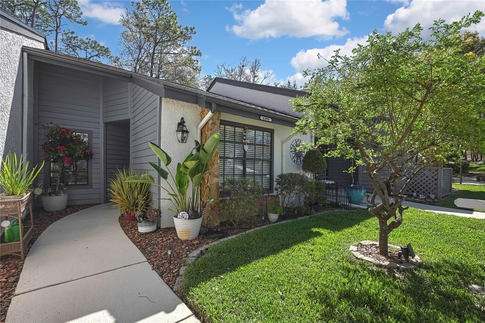 Long-term rental $1500/month (year lease) *******Located in the highly sought-after Timber Pines community! This beautifully updated 2-bedroom villa offers comfort, style, and convenience in a vibrant 55+ gated neighborhood. Enjoy a fully remodeled kitchen with KraftMaid soft-close cabinetry, quartz countertops, new appliances, and a cozy eat-in nook. Luxury vinyl plank flooring flows throughout the home, and the enclosed laundry area features a new stackable washer/dryer, utility sink, and modern barn door. The spacious living and dining area opens to a lovely paver patio with serene views of the Pine Preserve. The primary bedroom and bathroom have been tastefully updated, and recent upgrades include a 2023 HVAC system, water heater, and attic insulation. includes covered parking and a storage unit. Timber Pines offers unmatched amenities, including golf courses, pools, pickleball, a fitness center, clubhouse, restaurant, tennis, and over 100 clubs and activities. Live the active lifestyle you've been looking for.