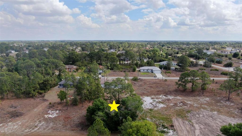 Photo of 841 Dante Avenue S, Lehigh Acres, FL 33974 (MLS # A4685165)