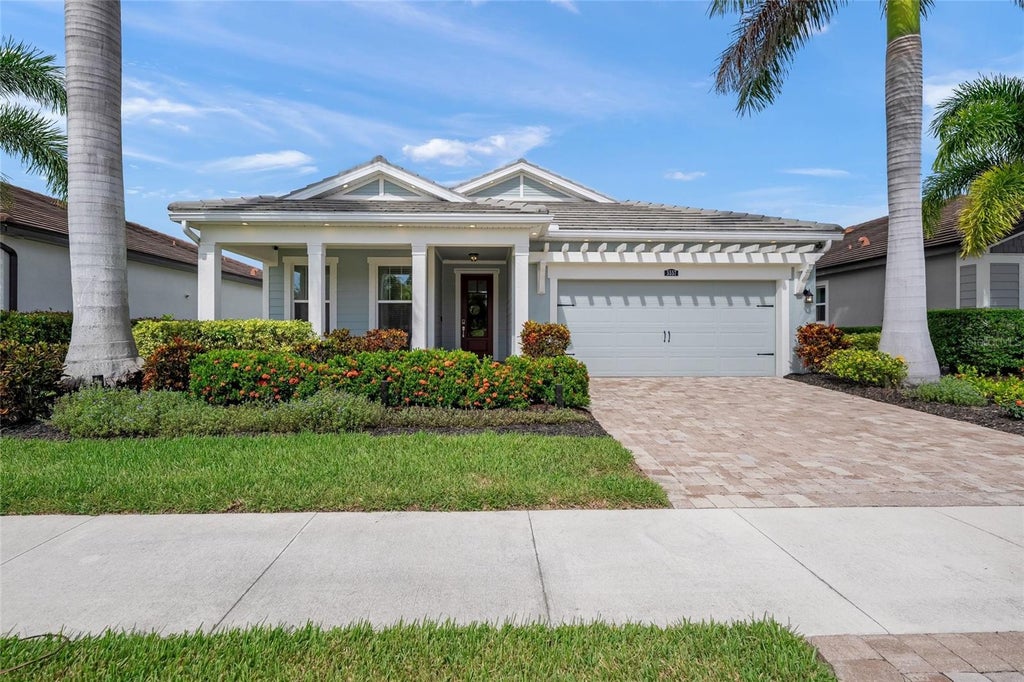 Photo of 5557 Long Shore Loop, Sarasota, FL 34238 (MLS # A4705753)