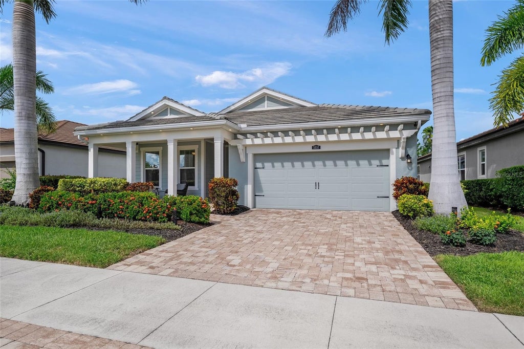 Photo of 5557 Long Shore Loop, Sarasota, FL 34238 (MLS # A4705753)