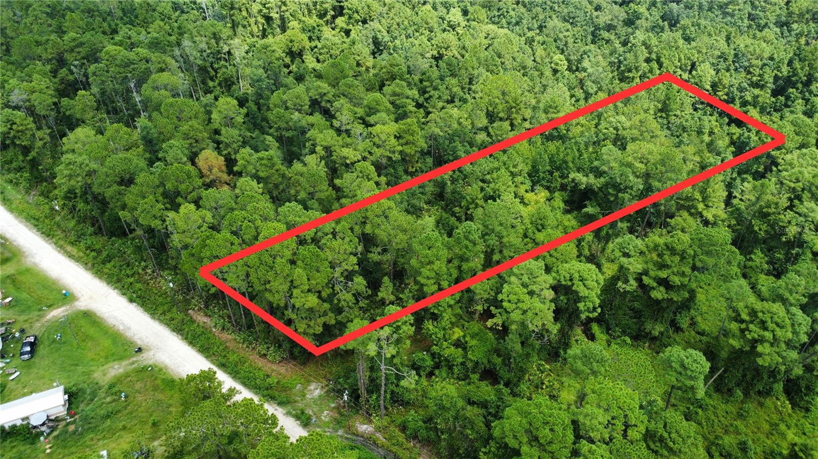 Corner Lot, Spacious 0.53-acre lot zoned for residential use, offering a great opportunity for an investment property or future home site. Nestled in the quiet community of Satsuma, this property is just minutes from the St. Johns River and a convenient public boat ramp—perfect for fishing, boating, and enjoying Florida’s natural beauty."