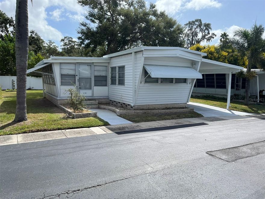 Fractional Ownership. Winner of the "Best of Dunedin" 2025 Award in Mobile Home Parks. Located 3 miles east of the Gulf of Mexico in Dunedin , Florida and .8 of a mile from the inter-coastal waterway, Golden Acres occupies 23.38 acres of prime property off of Main Street and Patricia Avenue with 224 mobile units. We are a resident owned (RO) park , meaning that when you purchase a share you own 1/224 of the park. You are part of a co-operative, with each owner having their own equal share of the park. The purchase price includes the share ($23,800) plus the cost of the coach. A Monthly Maintenance FEE of $210 covers other costs and amenities.
Facilities include an outdoor heated pool, recently renovated clubhouse with wireless, shuffleboard courts, wood-hobby shop, billiard room, and laundry facilities. An active, 55 plus, no-pet community offers a full range of recreational activities. Exercise classes, potluck dinners, cookouts, outings, golf courses nearby, and a full calendar of events are planned by the Recreation Committee. Sign ups 
are in the clubhouse. Available for residents are clubs, a golf league, shuffleboard league,cards, and more. Monthly calendars are in our printed distributed newsletters or the clubhouse. Our Beautification Committee is responsible for keeping the parks flower beds and entryway looking fresh and colorful as well as Christmas decorating. TB8433212 Lot 192 is available for sale