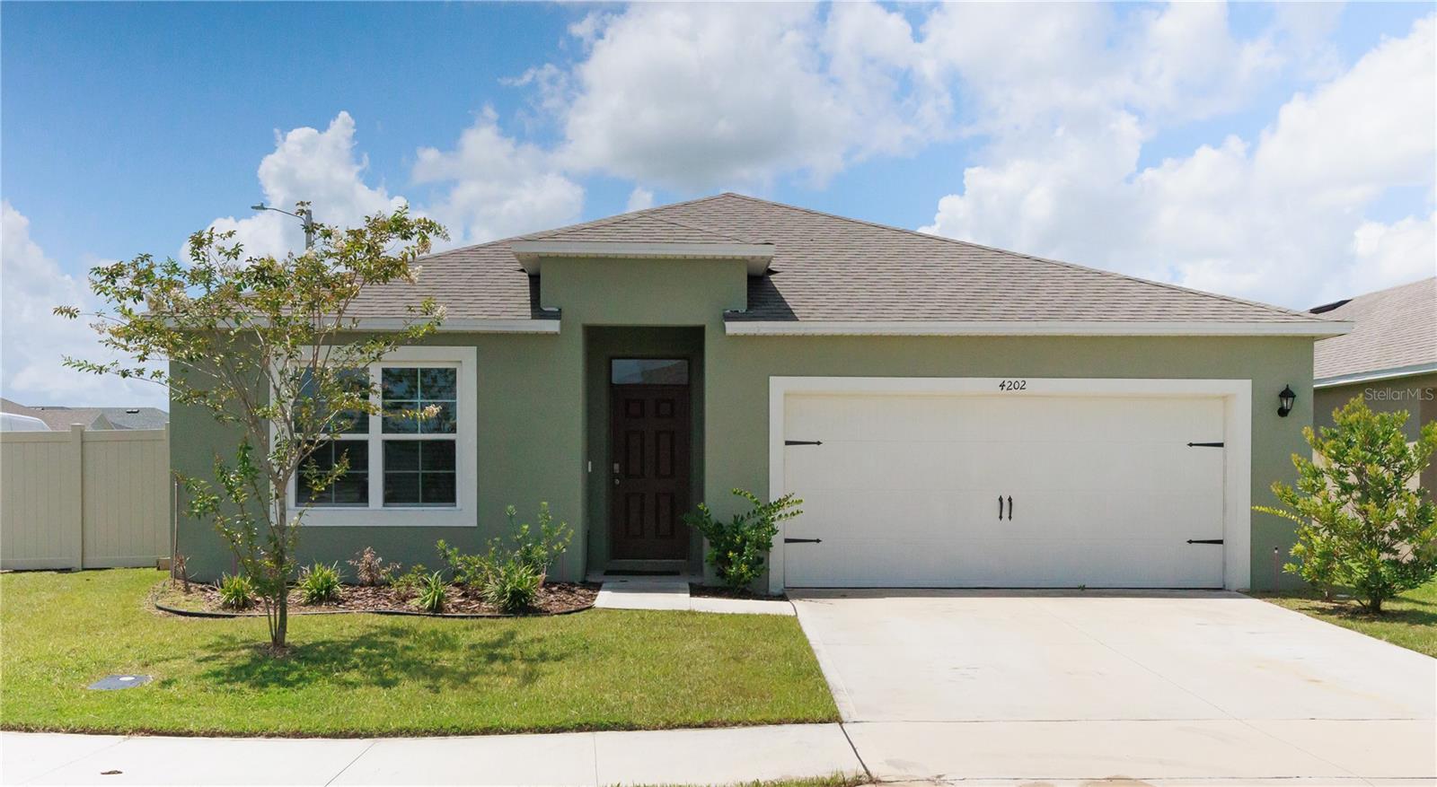 Built in 2023 | Corner Lot | Fenced Yard | Community Pool & Playground
Step into comfort, style, and functionality with this beautifully designed 4-bedroom, 2-bathroom home located in a thriving, up-and-coming community!
Open-concept kitchen with stunning stone countertops, stainless steel appliances & a spacious breakfast bar—perfect for hosting or everyday family meals
Split floor plan for the perfect balance of openness and privacy
Owner’s suite with walk-in shower, dual stone sinks, and a generously sized walk-in closet right off the bathroom
Fully fenced-in yard—ideal for weekend BBQs, kids’ playtime, or letting the pups run free
Sitting on a corner lot with beautiful curb appeal and extra space
Located in a community that offers a pool and playground for family fun and relaxation
Whether you're upsizing or planting roots, this home offers the ideal space for comfort, connection, and style—all in a growing neighborhood you’ll love.
Schedule your private showing today—this one won’t last long!