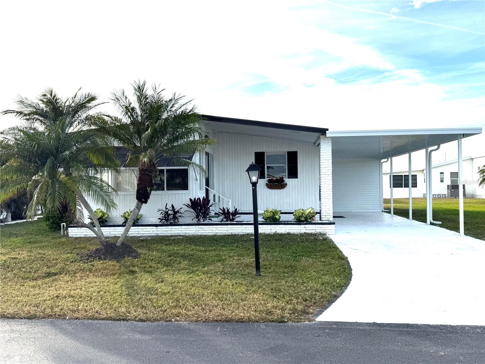 **Motivated Seller - Priced to Sell** Welcome to this charming, recently renovated 2-bedroom, 2-bathroom home located in the heart of North Port, FL. Nestled in the quiet and friendly 55+ neighborhood of La Casa, this home offers the perfect blend of comfort, convenience, and Florida lifestyle. This home was recently renovated with a new carport, new roof, new screens, new lighting, and new floors. An oversized storage room was just added to this home and a washer and dryer will also be added. This home has many features to enjoy, come see it for yourself! Conveniently located near shopping, dining, and parks, with easy access to US-41 and I-75. Don’t miss out on this North Port gem!