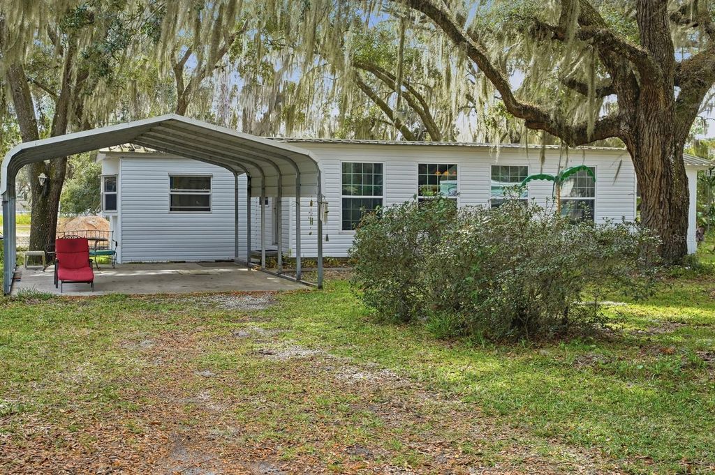 Photo of 105 Major Lane, Crescent City, FL 32112 (MLS # FC315265)