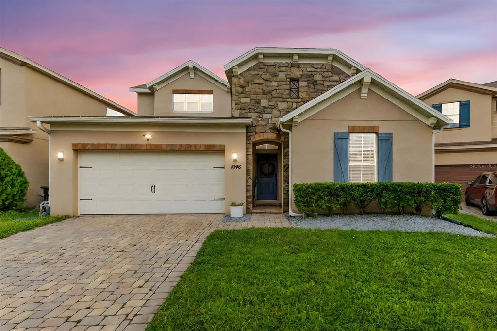 Photo of 1048 Fountain Coin Loop, Orlando, FL 32828 (MLS # O6370152)