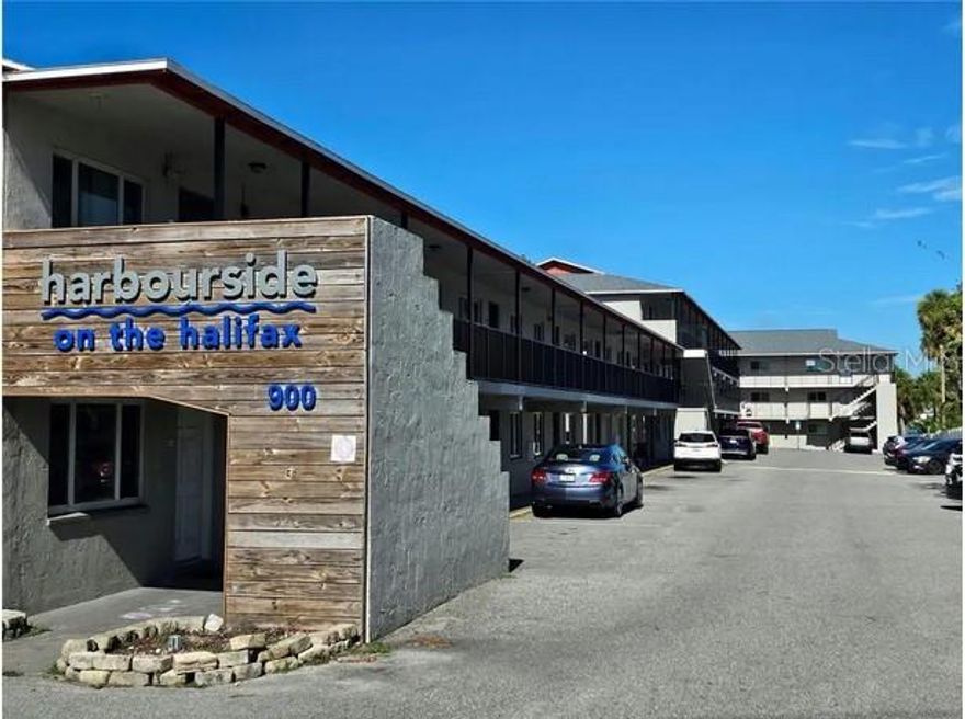 INVESTORS!! Your chance to own a 2 bedroom 1 bath, 2nd floor Condo. A GREAT INVESTMENT OPPORTUNITY! Seller is Motivated. Owner upgrades include AC 2023, Tank-less Electric Water Heater 2023, Refrigerator and Electric Stove also upgraded in 2024. Dishwasher 2025, Newer Roof 2019. There is a common laundry area and Community access to a boat dock overlooking the Halifax River. Harbourside is situated on the inter-coastal waterways and only a few minutes from the beautiful shores of Daytona Beach. Nearby shopping, dining and major roadways make this a prime location. Hurry! Do not let this one slip away. The property is currently leased. Please do not disturb the tenant.