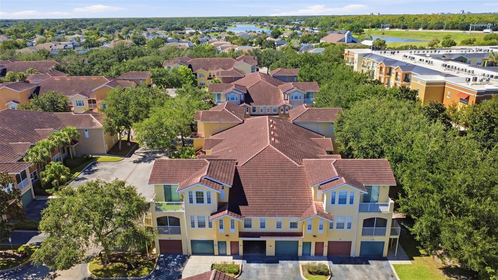 Photo of 12106 Poppy Field Lane #106, Orlando, FL 32837 (MLS # O6446573)