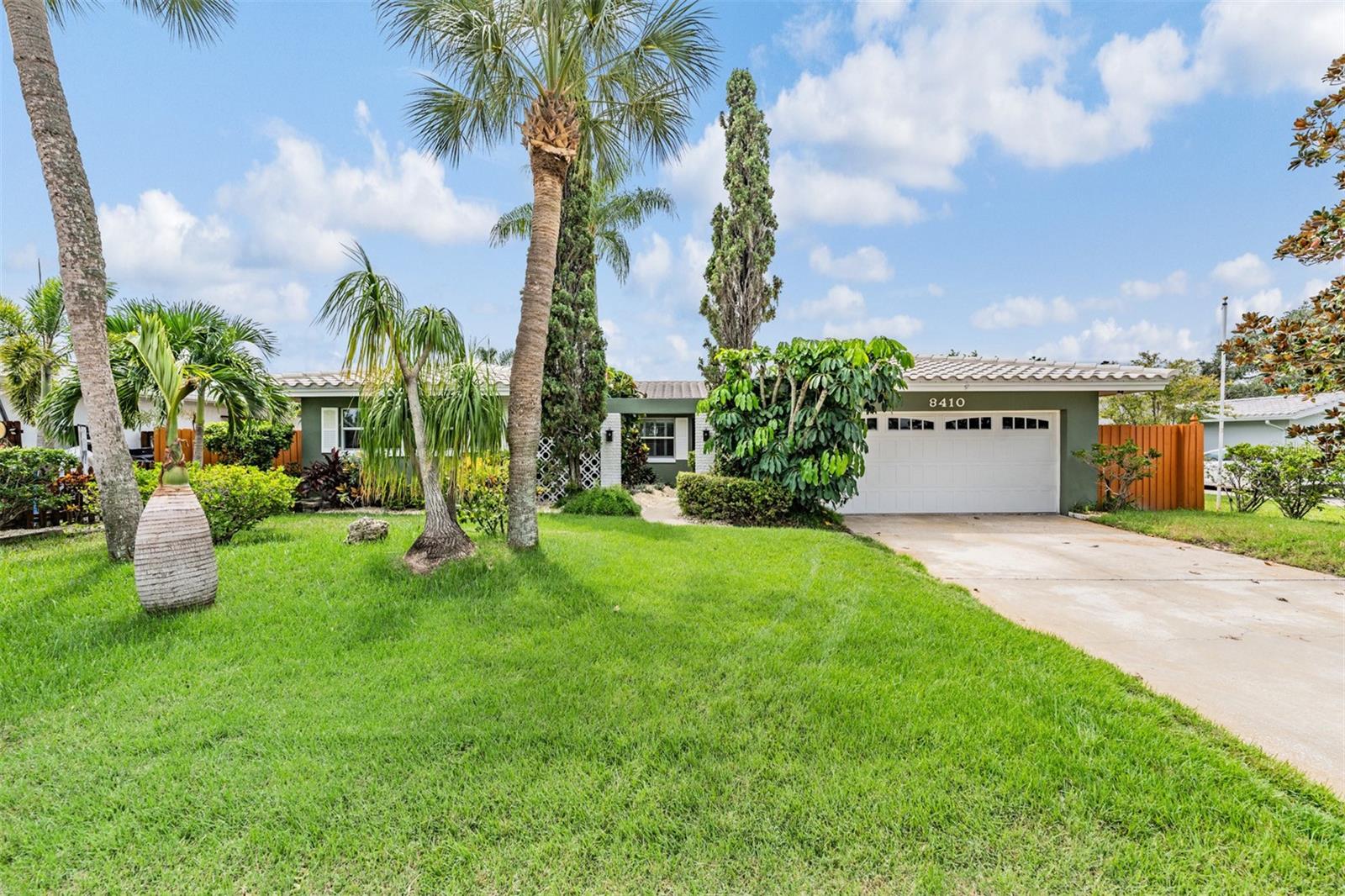 Beautifully updated 3 bedroom, 2 bath pool home in the Bay Crest Park neighborhood with boat access to Old Tampa Bay from the community boat ramp. Come enjoy your screened in pool and your fully fenced backyard (newer fence) which give you privacy. There is plenty of living space in this home and lots of storage for all of your personal belongings. The front of the home features a living room and dining room both finished with crown molding along the ceiling. Off of the living room is a den/study entered through frosted double doors. The den has tray ceilings, ceiling fans and 2 built in closets so it could serve as a 4th bedroom, a home office or additional space for entertaining. The family room is at the rear of the home and is accessed through a barn door in the living room or from the kitchen. The family room features brick flooring, a tray ceiling, built in shelving and ceiling fans. Access to the pool and screened lanai is from the family room. The primary bedroom is off of the family room and has a walk-in closet along with a wall of built in closets so plenty of closet space here. There is an updated ensuite primary bath with shower that has a lead glass entry door. There are 2 additional storage closets between the family room and primary bedroom. The kitchen is updated with granite counters, stainless steel appliances with extended warranties, a closet pantry with a custom lead glass door and additional storage cabinets for all of your small appliances. The additional 2 bedrooms are at the front of the home off of the dining room. They are both a good size and share an updated hall bath between them. The hallway to the bedrooms features a lead glass pocket door. Updates to this home include Tile roof (2018); Storm rated garage door (2021); windows and doors (Nuair – 2005); and electrical panel (2006). 2024 updates include: new HVAC system (4 years remaining on warranty per the seller) and new ductwork; new water heater (extended warranty); new pool pump; all new kitchen appliances (extended warranty); all new flooring – LVP in the main living areas and new carpet in the bedrooms. There is also an ADT security system for piece of mind. Seller will be renewing their flood insurance in October ($3,284) and the policy is transferable. Bay Crest Park features a community boat ramp with access to Old Tampa Bay so bring your boat and jet skis. With no deed restrictions you can park them in your driveway or your garage. The community is conveniently located 10 minutes from Tampa International Airport and close to shopping, restaurants and all the Tampa Bay area has to offer. Come see this home and make it yours today!