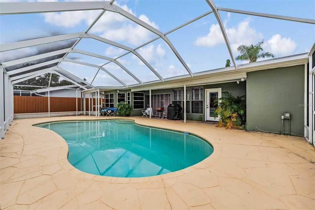 Photo of 8410 Boulder Place, Tampa, FL 33615 (MLS # TB8427085)