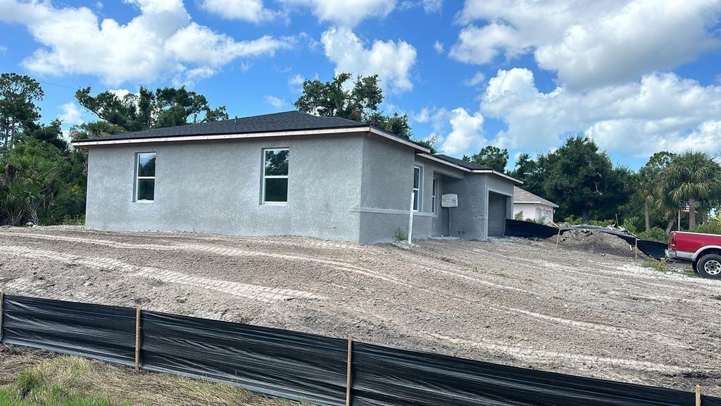 Photo of 9149 Willmington Boulevard, Englewood, FL 34224 (MLS # TB8388681)