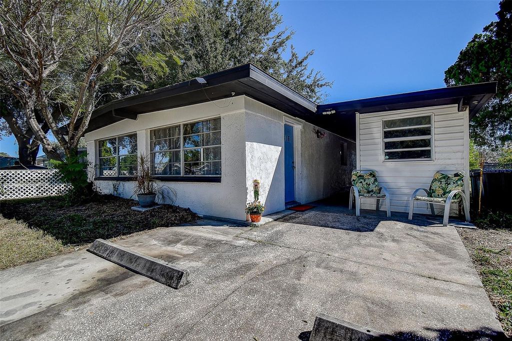 Photo of 1818 Hacienda Way, Holiday, FL 34690 (MLS # TB8437960)