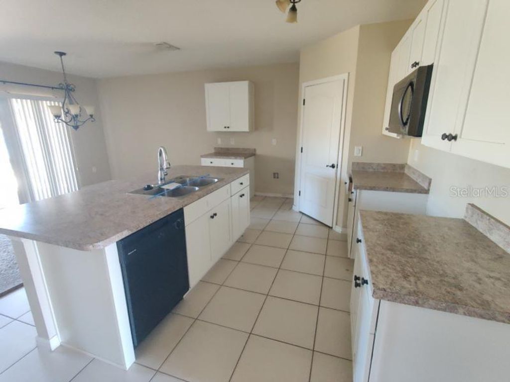 Photo of 2655 Star Coral Lane, New Smyrna Beach, FL 32168 (MLS # O6360260)